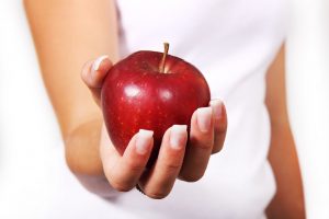 Apple in a hand
